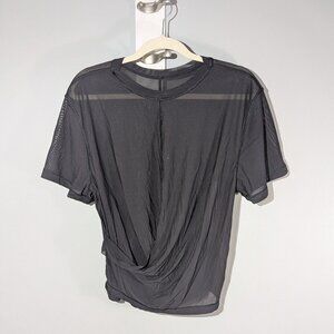 Lululemon Sheer black cropped top with knot.